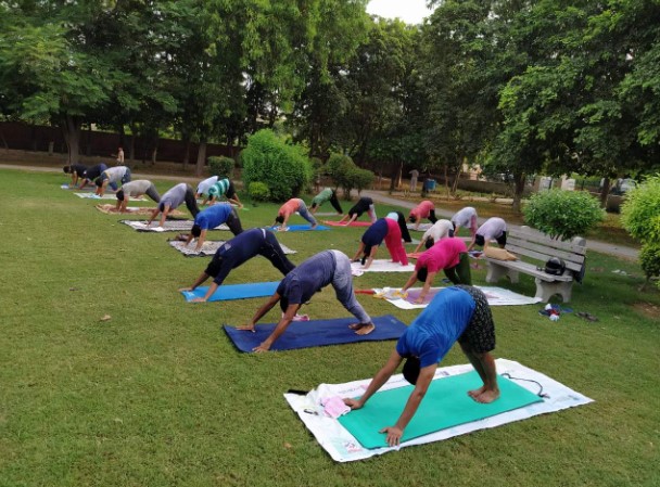 Diverse People in India Practicing Yoga
